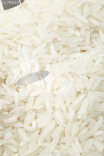 Image of Uncooked white rice close up 