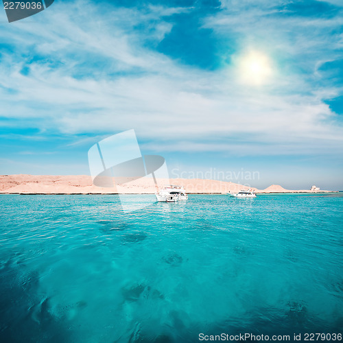 Image of Yachts near island