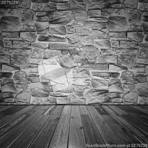 Image of Stone wall and wood floor