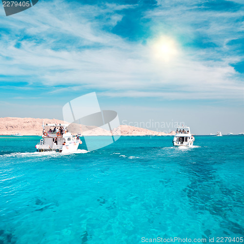 Image of Yachts near to coral reef