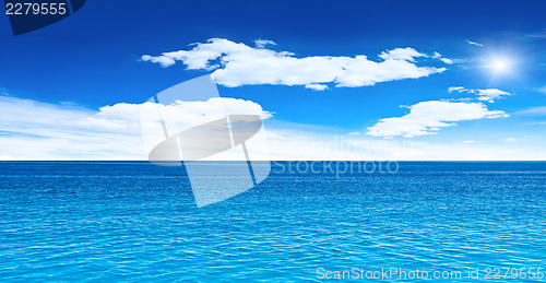 Image of Cloudy sky, sea and sun