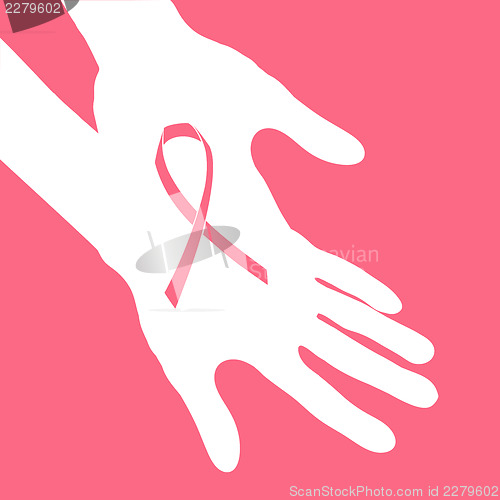 Image of Breast cancer ribbon in hands.