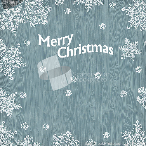 Image of Christmas greetings with snowflakes on wooden texture. Vector il