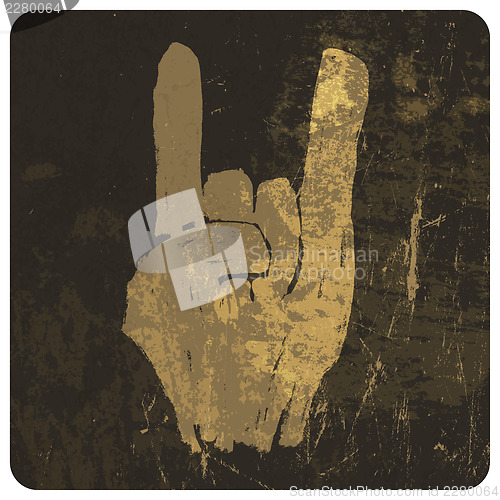 Image of Grunge "rock on" gesture. Vector