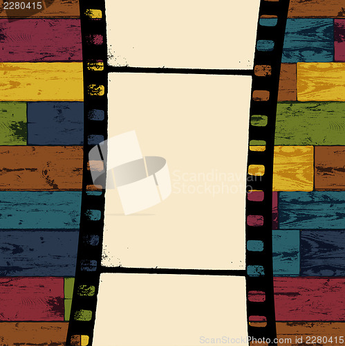 Image of Film strip on colorful seamless wooden background. Vector, EPS10