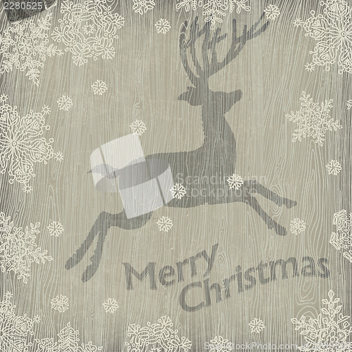 Image of Christmas deer with snowflakes on wooden texture. Vector illustr