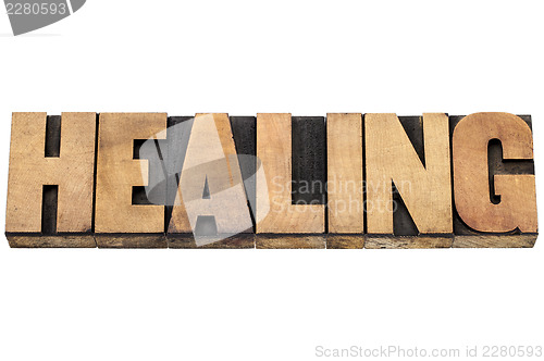 Image of healing word in wood type