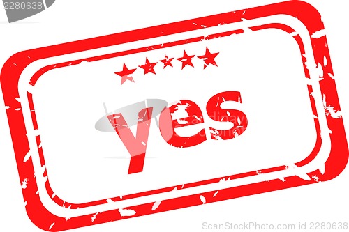 Image of yes red rubber stamp over a white background