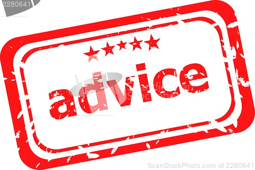 Image of advice on red rubber stamp over a white background