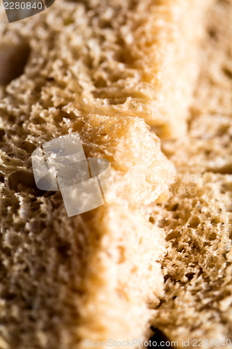 Image of Closeup of a fresh wheat bread slice