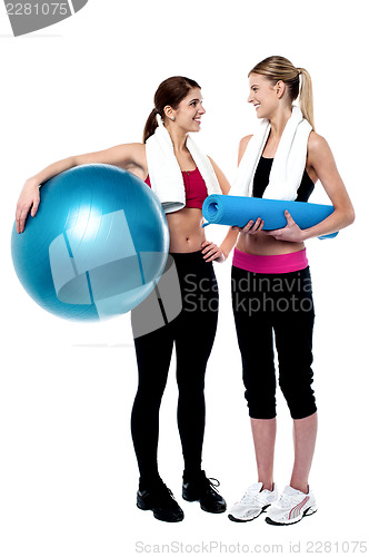 Image of Two girls communicating after workout