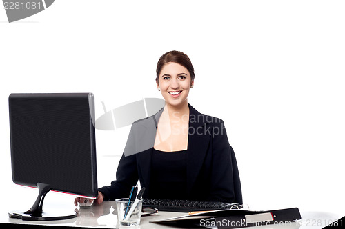 Image of Pretty businesswoman at work