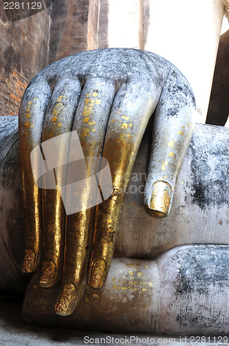 Image of Statue of a giant Buddha's hand in the Historical Park of Sukhothai
