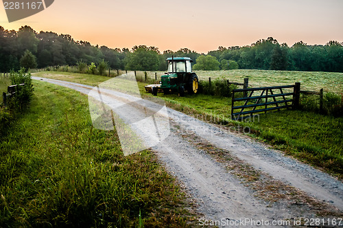 Image of old tractor on a farm