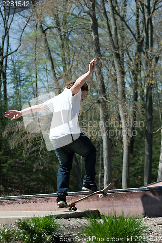 Image of Skateboarder on a Rail