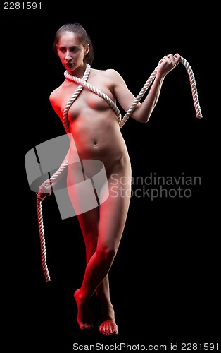 Image of attractive naked woman with rope