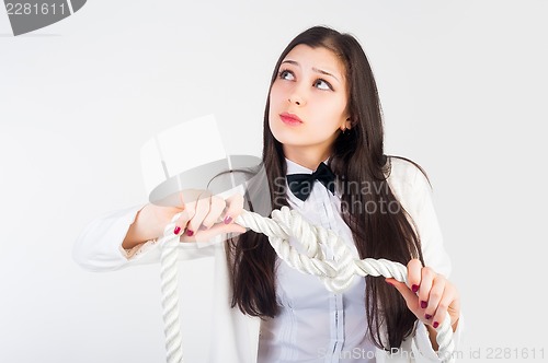 Image of business woman with knot of "problem"