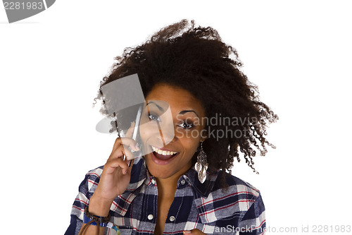 Image of Young african american woman on cellphone