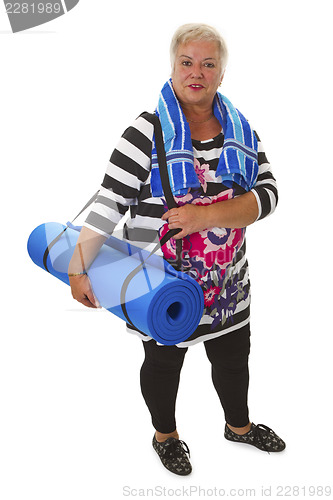 Image of Female senior with blue gym mat 