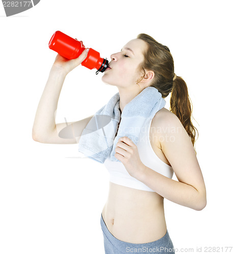 Image of Fit girl drinking water