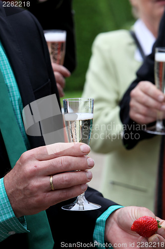 Image of Celebrating with a glass of champagne