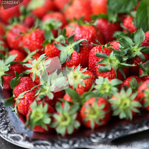 Image of Silver tray and fresh strawberries