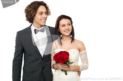 Image of Young couple looking outside