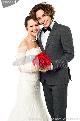 Image of Beautiful new bridegroom smiles for the camera