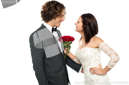 Image of Girl flirting with her man, wedding concept