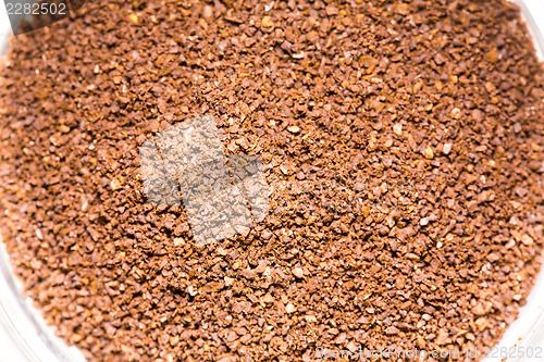 Image of Red stones in a container