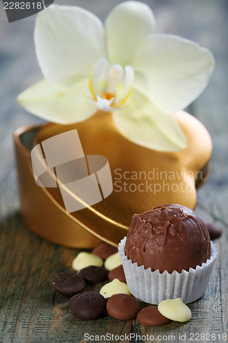 Image of Homemade candy, chocolate and flower.