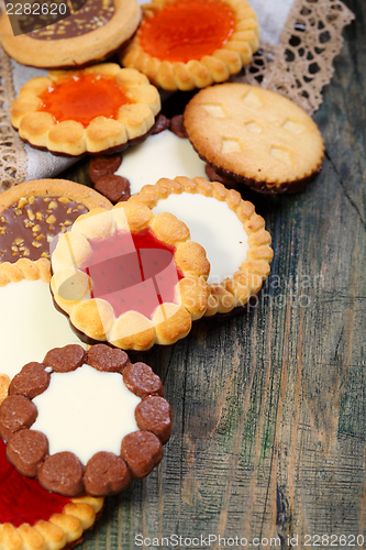 Image of Cookies with chocolate and jelly filling.