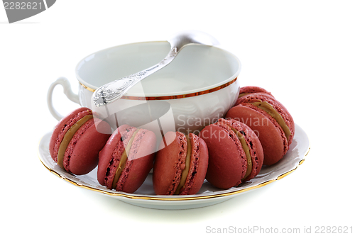 Image of Macaroons and white cup.