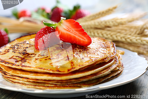 Image of Pancakes with honey.