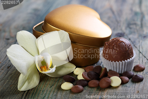 Image of Handmade chocolates and flowers.