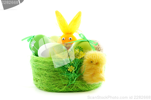 Image of Green basket with Easter eggs.