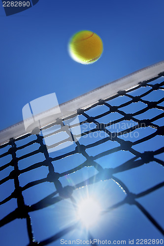 Image of Tennis Ball over Net