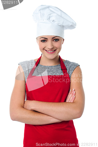 Image of Cheerful young female chef