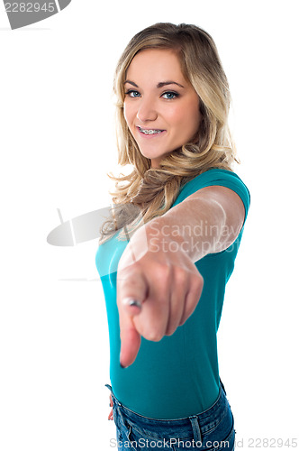 Image of Cute young girl pointing you out