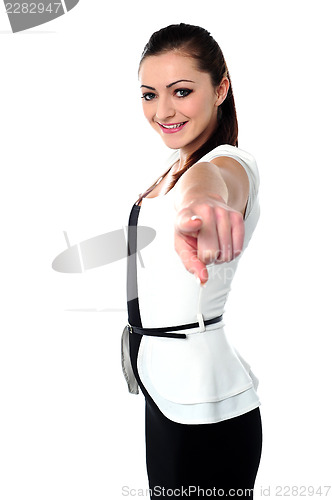 Image of Charming girl pointing towards you
