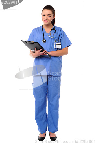 Image of Smiling young female doctor at duty