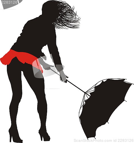 Image of Female wrestling with the wind