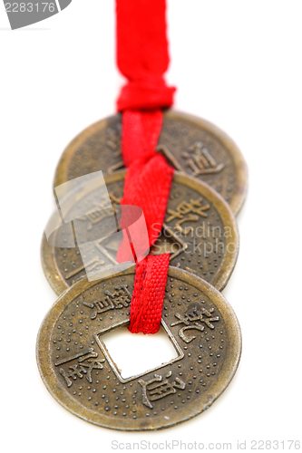 Image of Three Chinese coins.