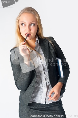Image of portrait of a business woman with organizer