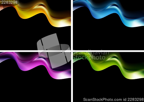 Image of Bright waves on the black background