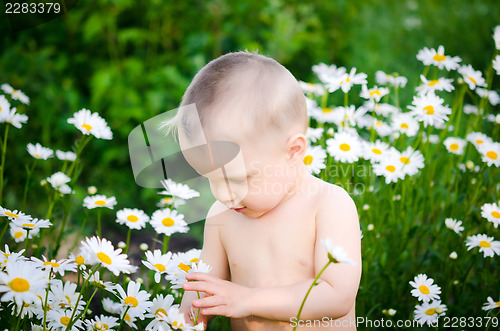 Image of child with flowers