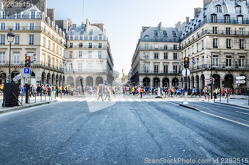 Image of Spectators and participants of the annual Paris Marathon on the 