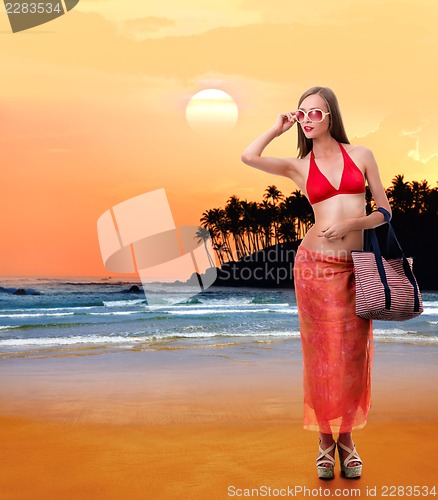 Image of Caucasian woman in bikini dress
