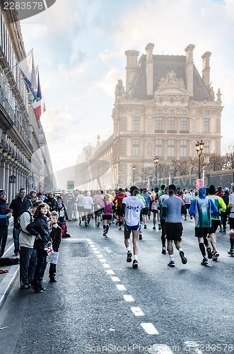 Image of Spectators and participants of the annual Paris Marathon on the 