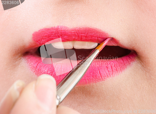 Image of Beautician artist applying makeup